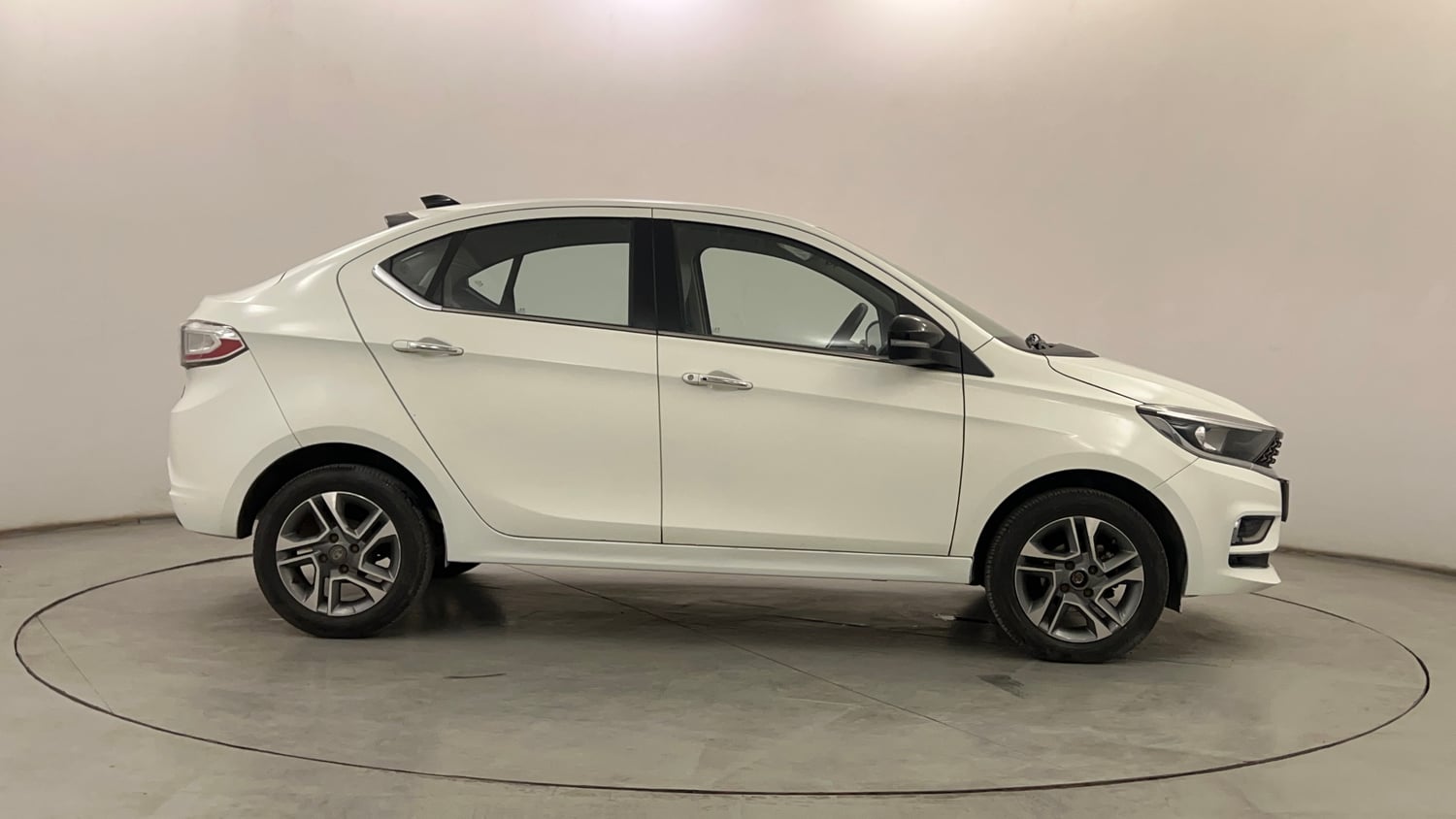 Used 2024 Tata Tigor XZ Plus Petrol Manual exterior RIGHT SIDE VIEW