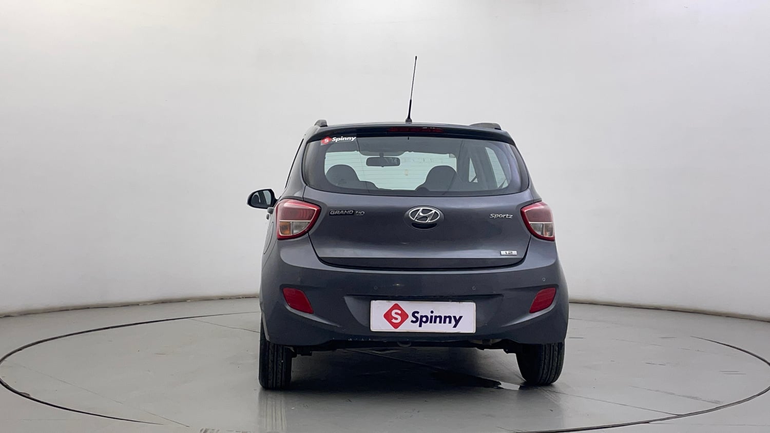 Used 2015 Hyundai Grand i10 Sportz 1.2 Kappa VTVT Petrol Manual exterior BACK VIEW