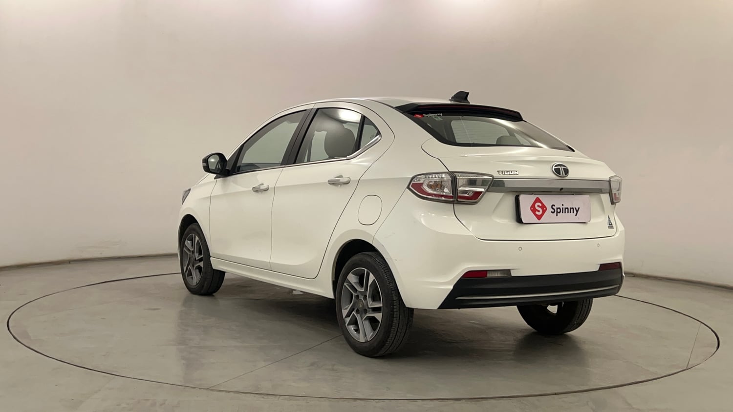 Used 2024 Tata Tigor XZ Plus Petrol Manual exterior LEFT REAR CORNER VIEW