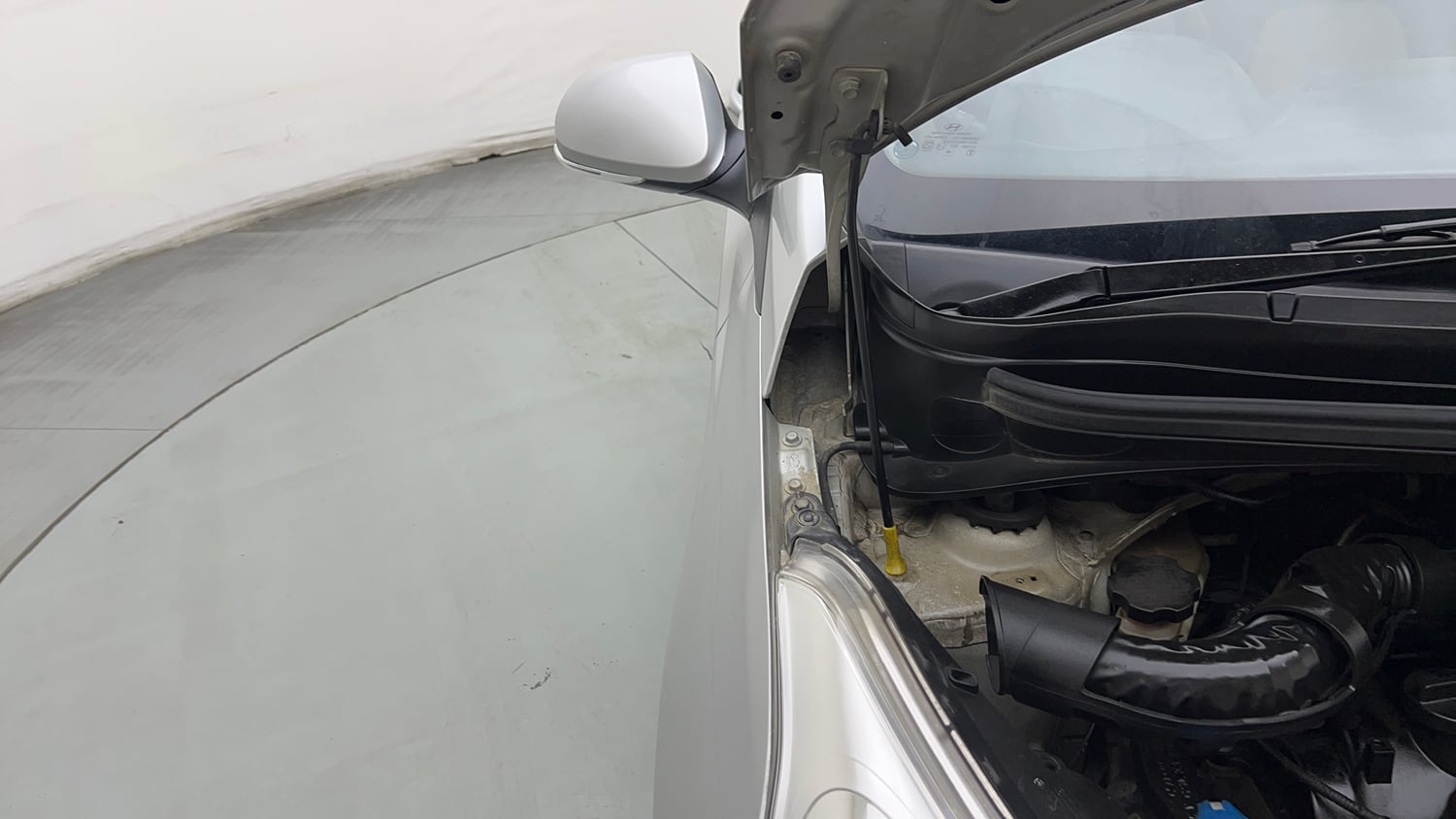 Used 2018 Hyundai Grand i10 Sportz (O) 1.2 Kappa VTVT Petrol Manual engine ENGINE RIGHT SIDE HINGE & APRON VIEW
