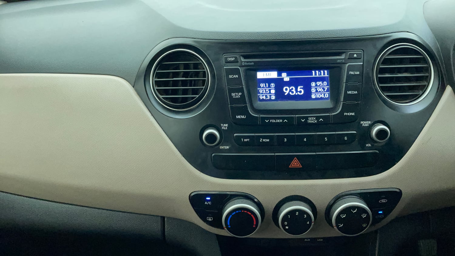Used 2015 Hyundai Grand i10 Sportz 1.2 Kappa VTVT Petrol Manual interior MUSIC SYSTEM & AC CONTROL VIEW