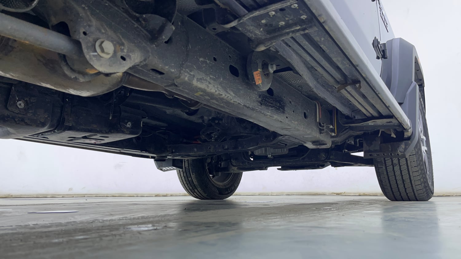 Used 2026 Mahindra Thar Roxx MX5 Petrol AT 2WD Petrol Automatic extra REAR RIGHT UNDERBODY VIEW