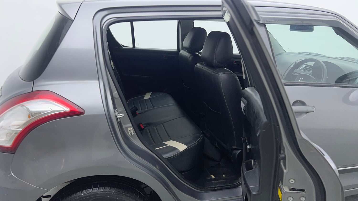 Used 2014 Maruti Suzuki Swift LXi Petrol Manual interior RIGHT SIDE REAR DOOR CABIN VIEW