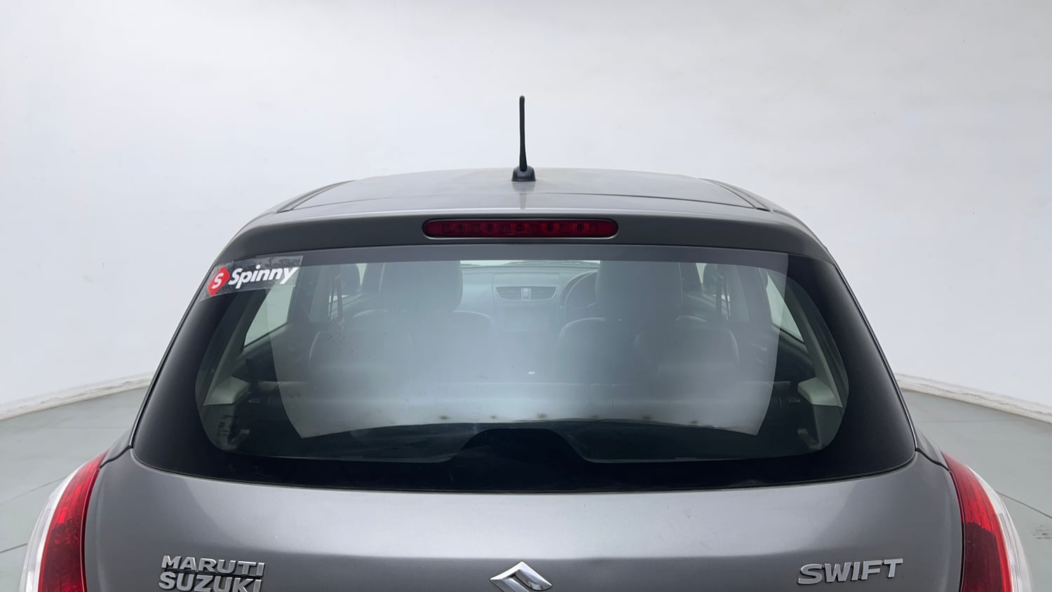 Used 2014 Maruti Suzuki Swift LXi Petrol Manual exterior BACK WINDSHIELD VIEW