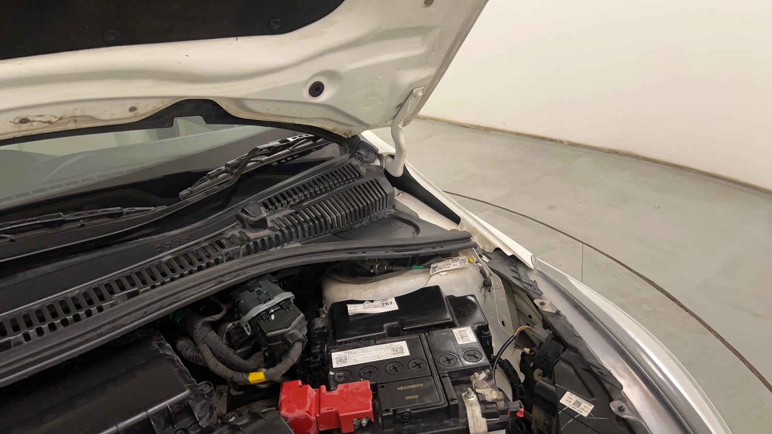 Used 2024 Tata Tigor XZ Plus Petrol Manual engine ENGINE LEFT SIDE HINGE & APRON VIEW