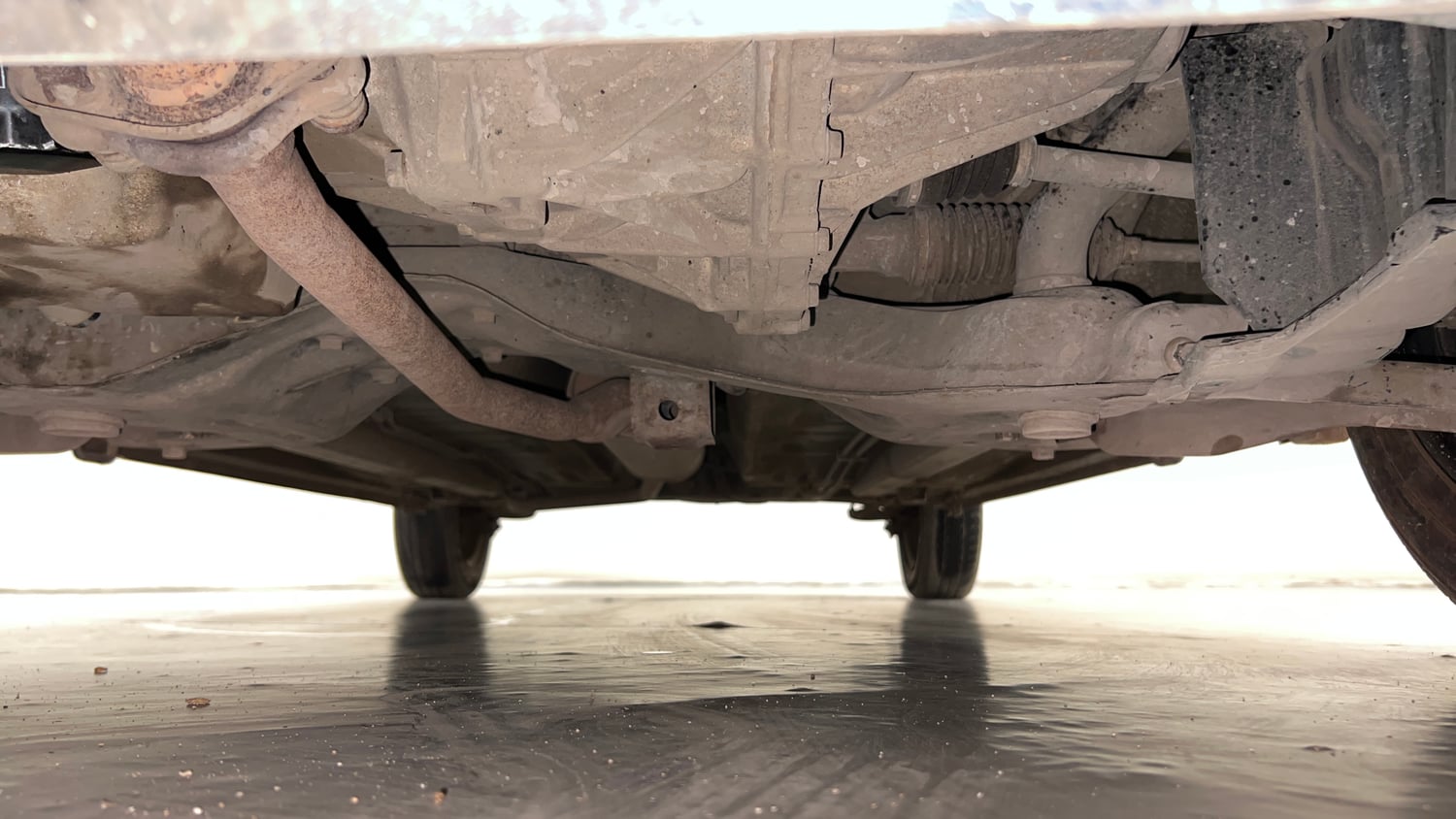 Used 2015 Maruti Suzuki Celerio VXi AMT Petrol Automatic extra FRONT LEFT UNDERBODY VIEW