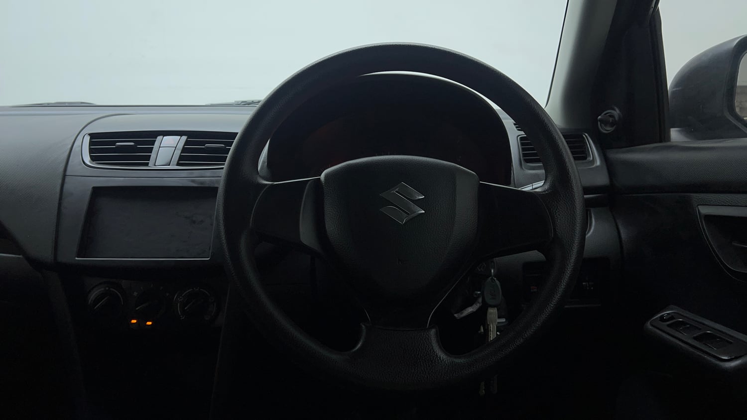 Used 2014 Maruti Suzuki Swift LXi Petrol Manual interior STEERING VIEW