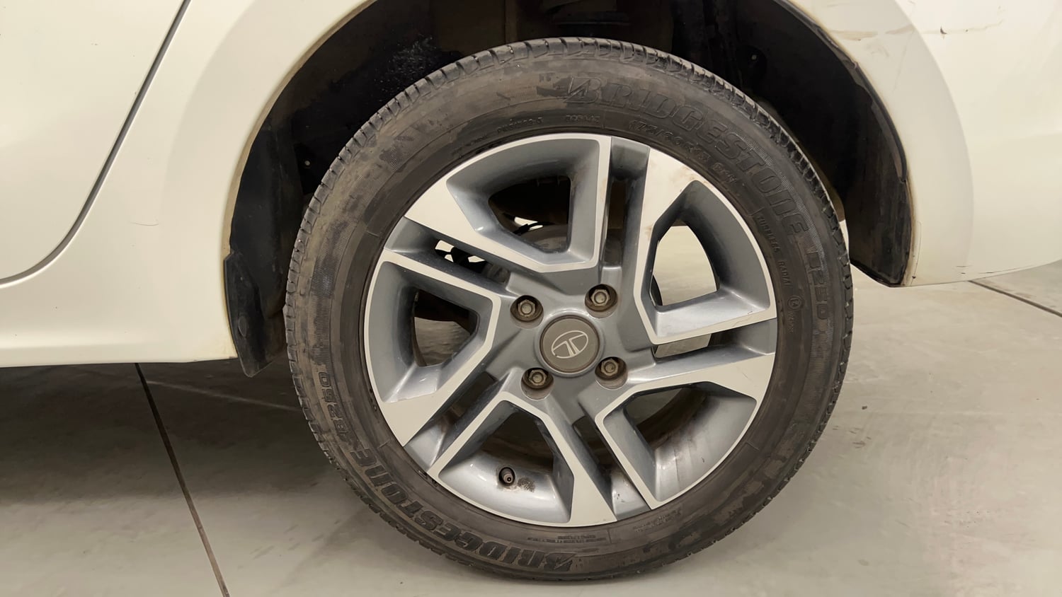 Used 2024 Tata Tigor XZ Plus Petrol Manual tyres LEFT REAR TYRE RIM VIEW
