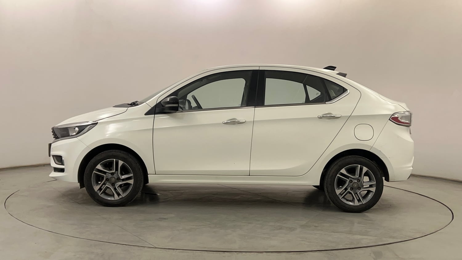 Used 2024 Tata Tigor XZ Plus Petrol Manual exterior LEFT SIDE VIEW