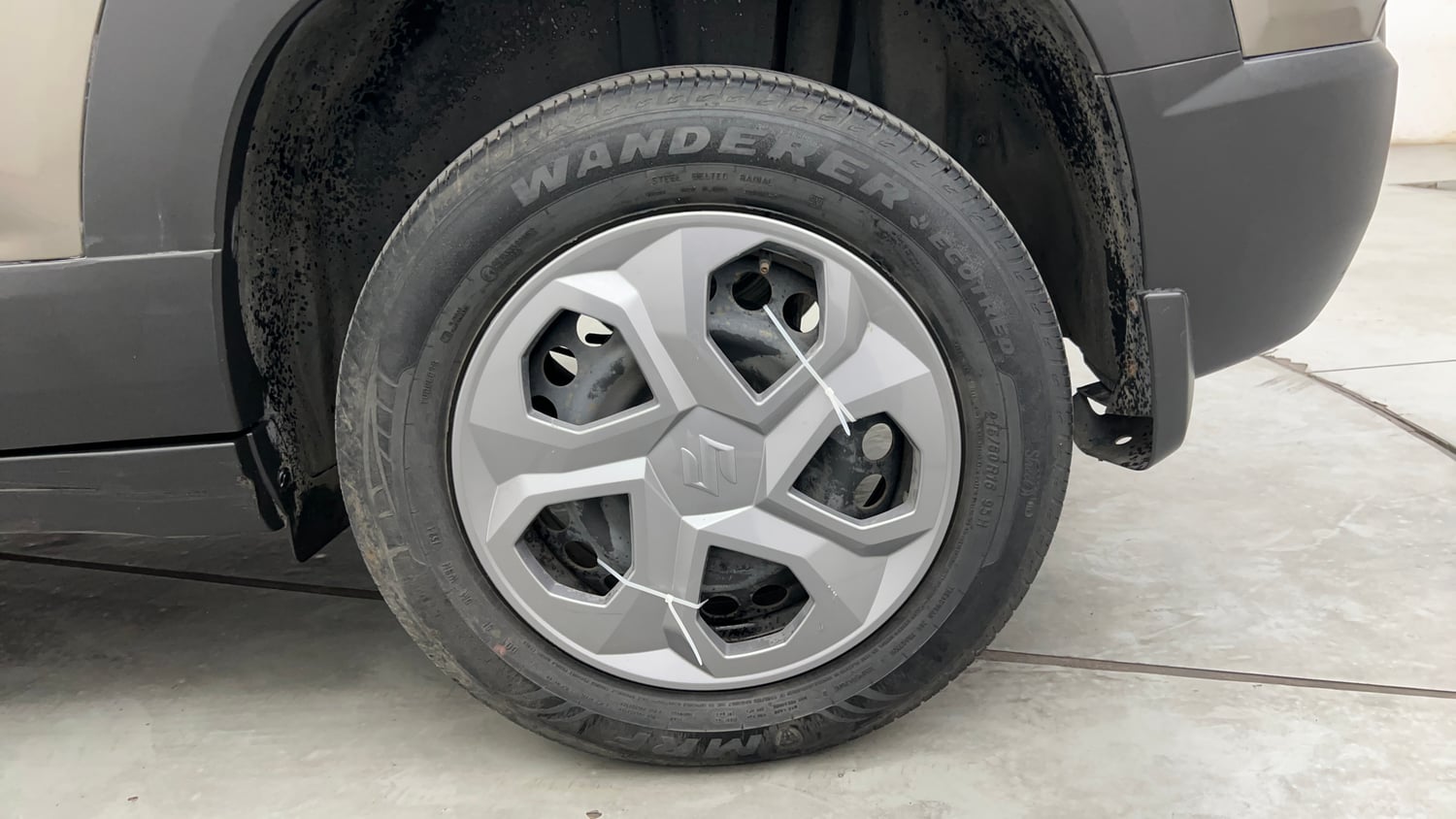 Used 2024 Maruti Suzuki Brezza LXi S-CNG Cng Manual tyres LEFT REAR TYRE RIM VIEW