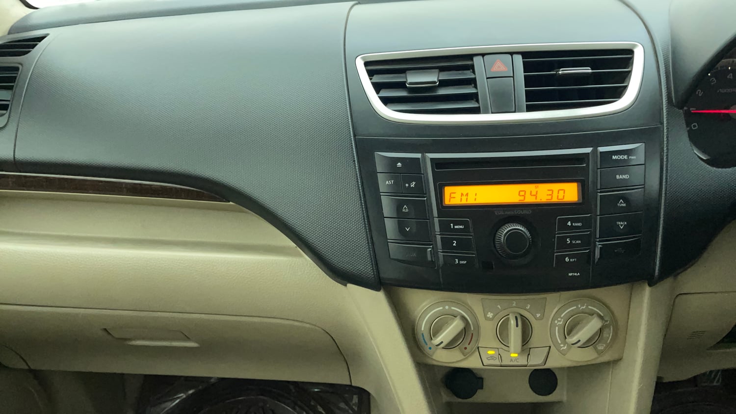 Used 2012 Maruti Suzuki Swift Dzire VXI Petrol Manual interior MUSIC SYSTEM & AC CONTROL VIEW