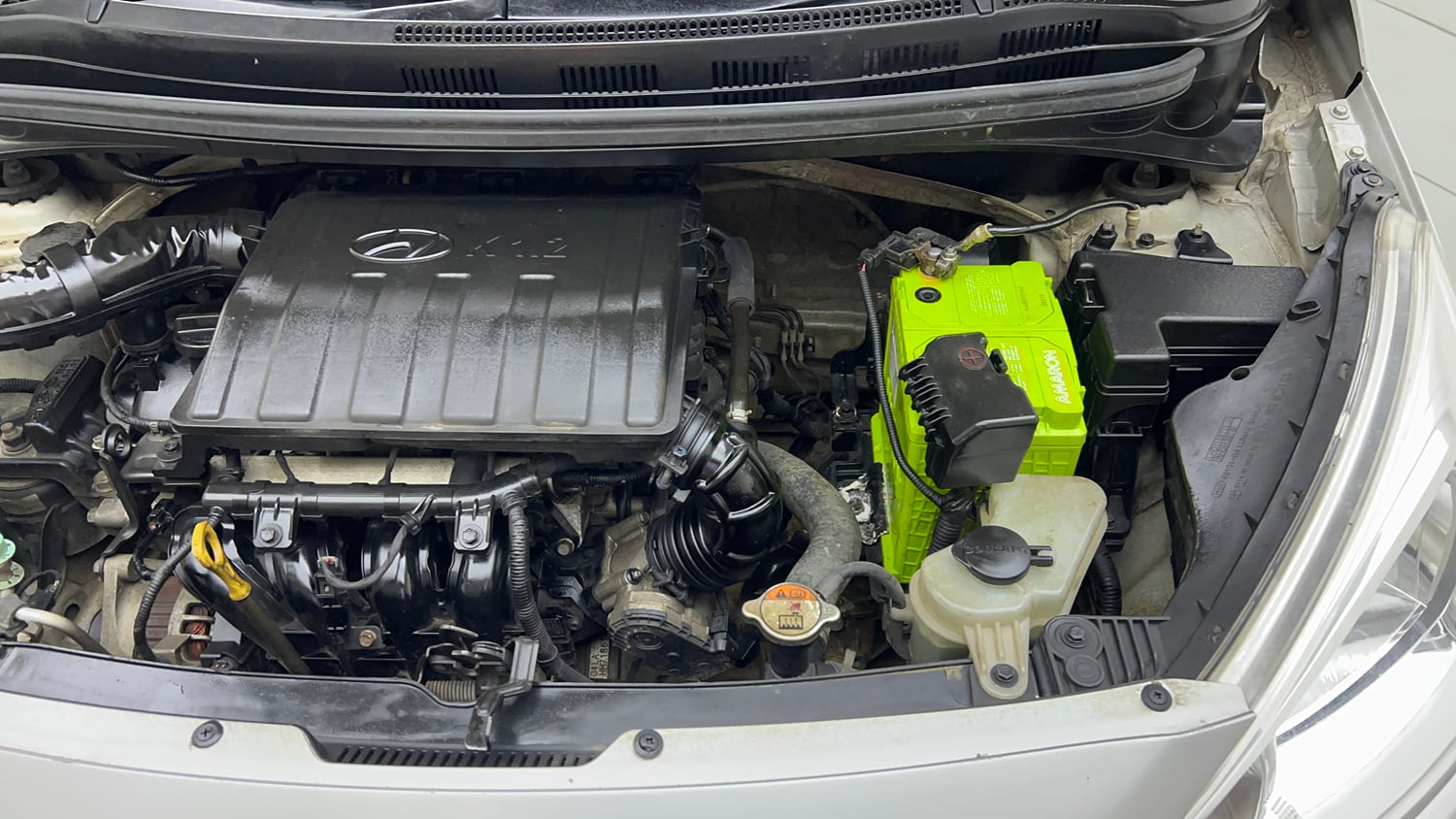 Used 2018 Hyundai Grand i10 Sportz (O) 1.2 Kappa VTVT Petrol Manual engine ENGINE LEFT SIDE VIEW