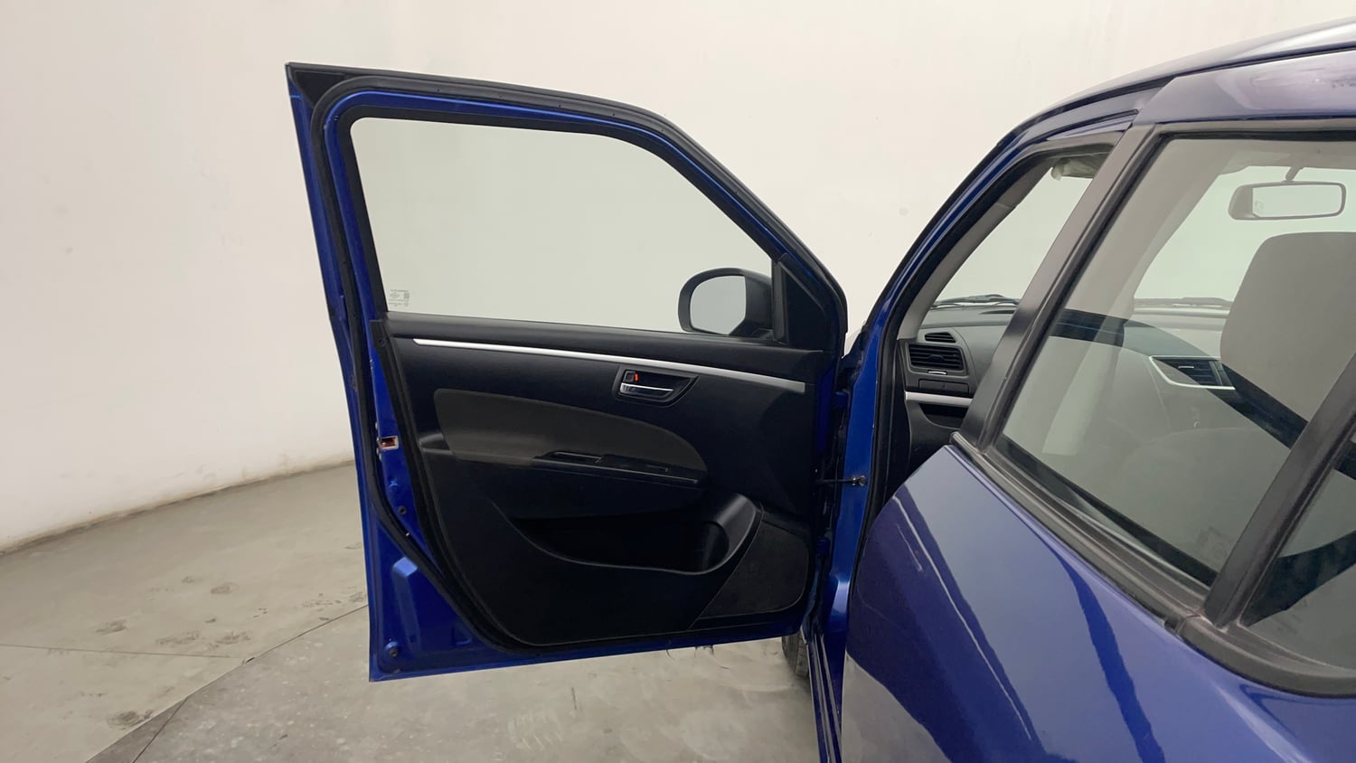 Used 2014 Maruti Suzuki Swift VXi Petrol Manual interior LEFT FRONT DOOR OPEN VIEW