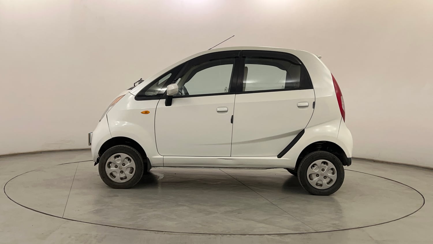 Used 2015 Tata Nano Twist XT Petrol Manual exterior LEFT SIDE VIEW