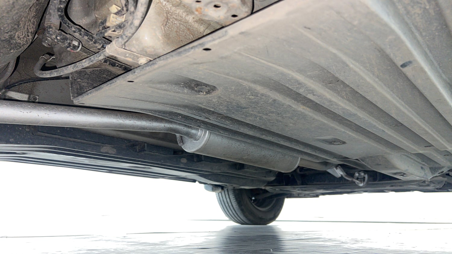 Used 2024 Maruti Suzuki Brezza LXi S-CNG Cng Manual extra REAR RIGHT UNDERBODY VIEW