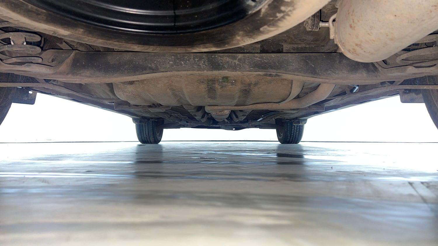 Used 2022 Kia Carens Prestige Plus 1.4 Petrol MT 7 STR Petrol Manual extra REAR UNDERBODY VIEW (TAKEN FROM REAR)