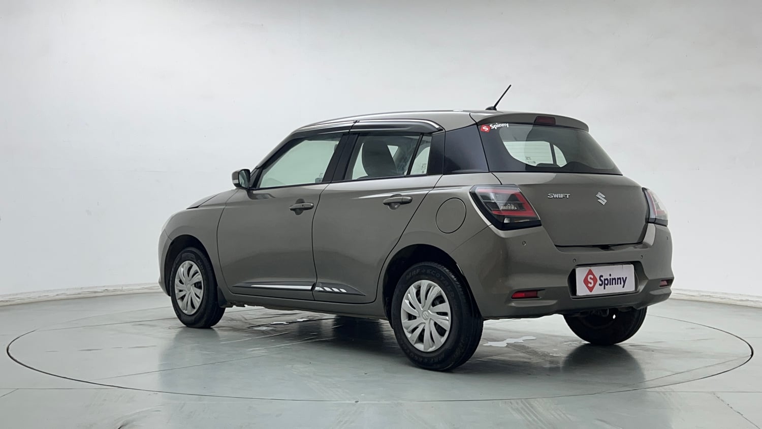 Used 2024 Maruti Suzuki Swift VXi (O) AMT Petrol Automatic exterior LEFT REAR CORNER VIEW