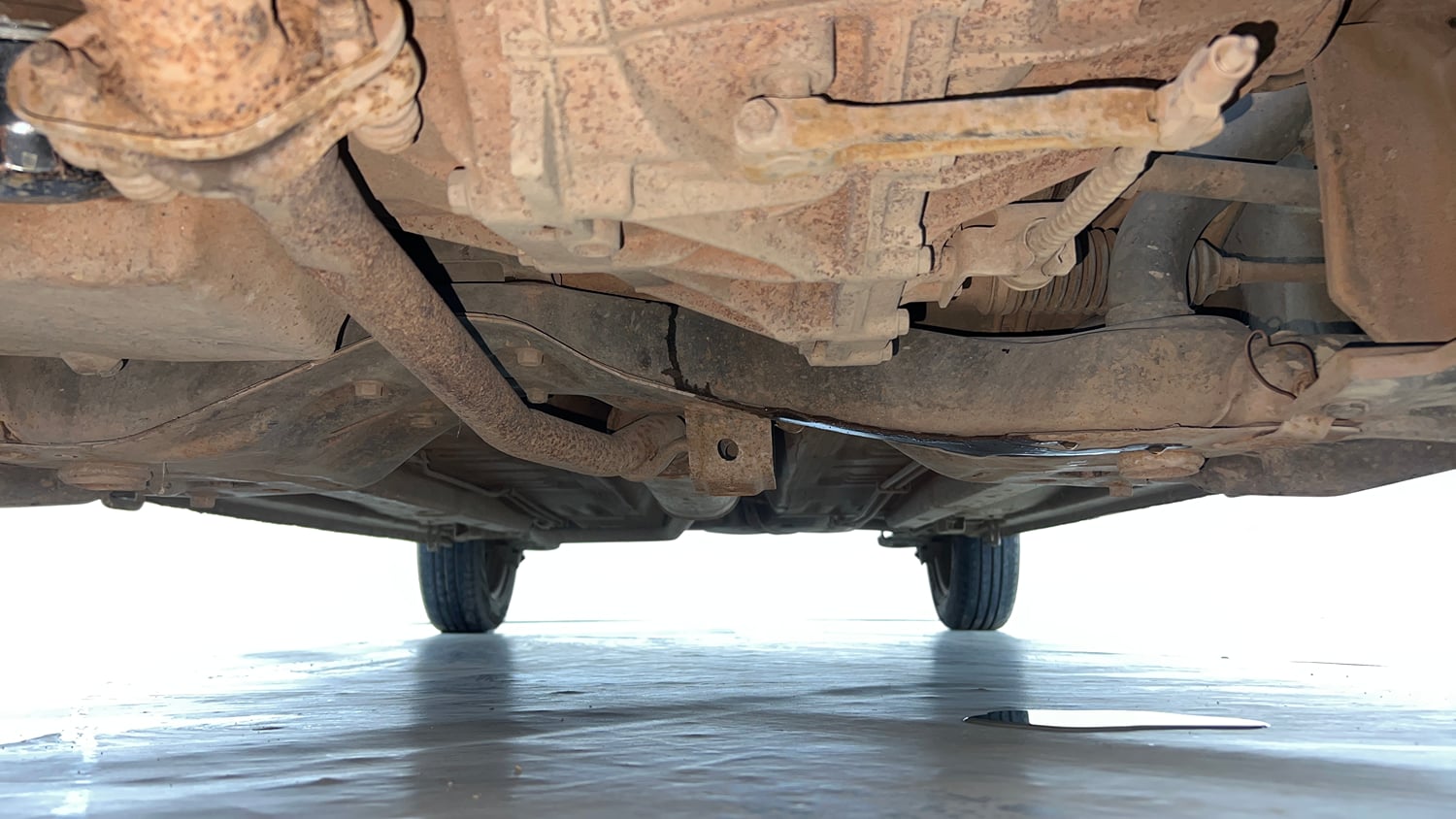 Used 2014 Maruti Suzuki Celerio VXi Petrol Manual extra FRONT LEFT UNDERBODY VIEW