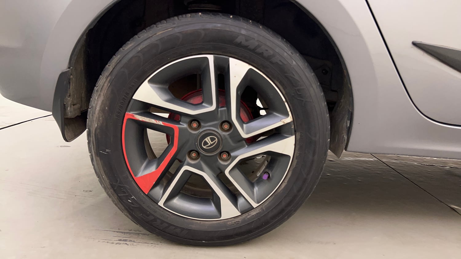 Used 2019 Tata Tigor Revotron XZ+ Petrol Manual tyres RIGHT REAR TYRE RIM VIEW