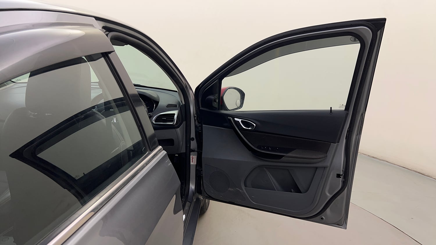Used 2019 Tata Tigor Revotron XZ+ Petrol Manual interior RIGHT FRONT DOOR OPEN VIEW