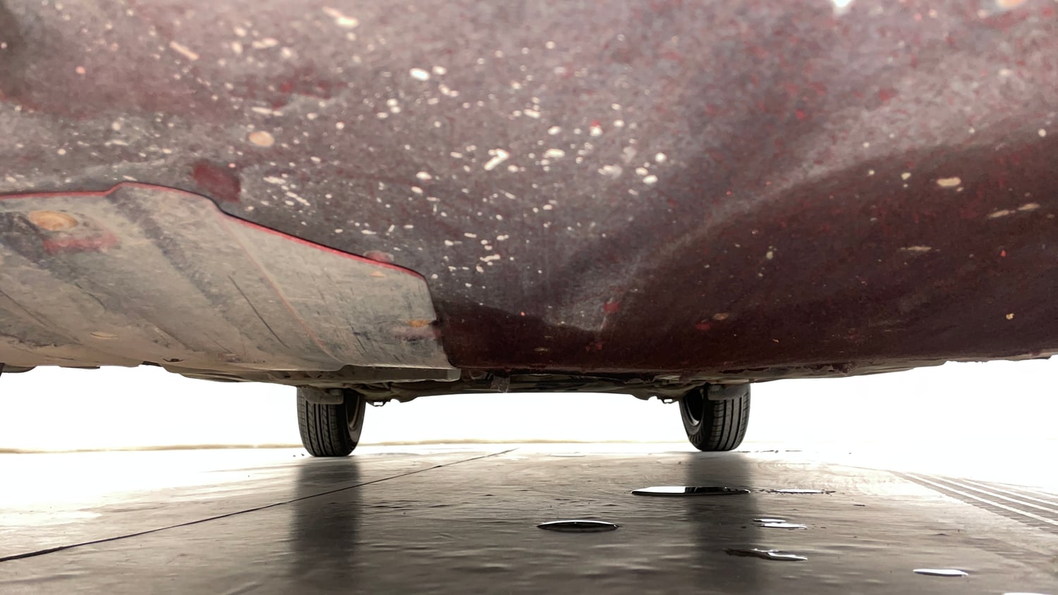 Used 2022 Maruti Suzuki Swift VXi AMT Petrol Automatic extra FRONT LEFT UNDERBODY VIEW