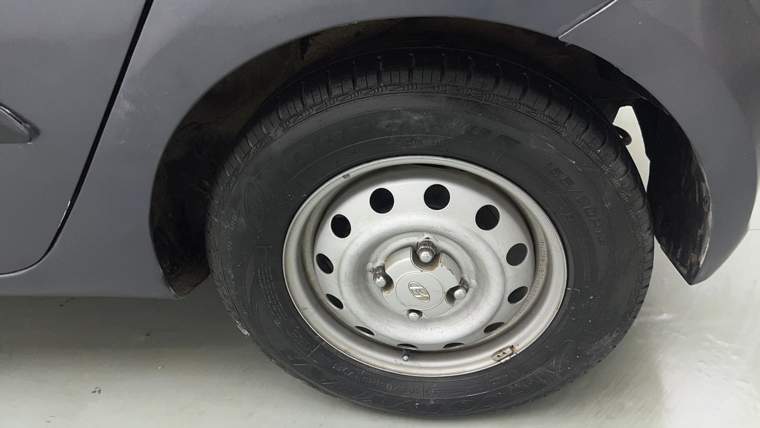 Used 2015 Hyundai i10 Magna 1.1 CNG (Outside Fitted) Cng Manual tyres LEFT REAR TYRE RIM VIEW