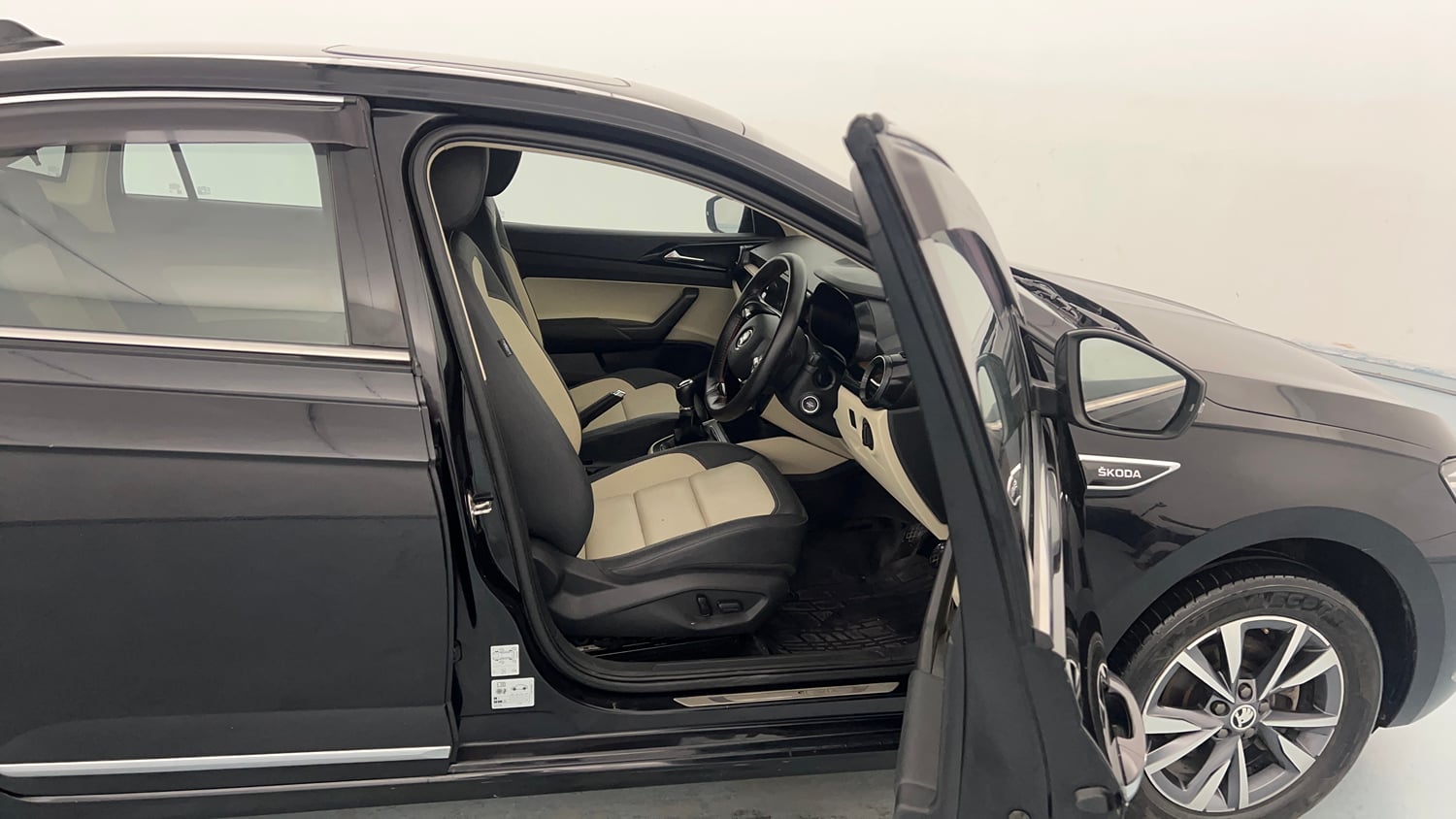 Used 2024 Skoda Slavia Style 1.0L TSI MT Petrol Manual interior RIGHT SIDE FRONT DOOR CABIN VIEW