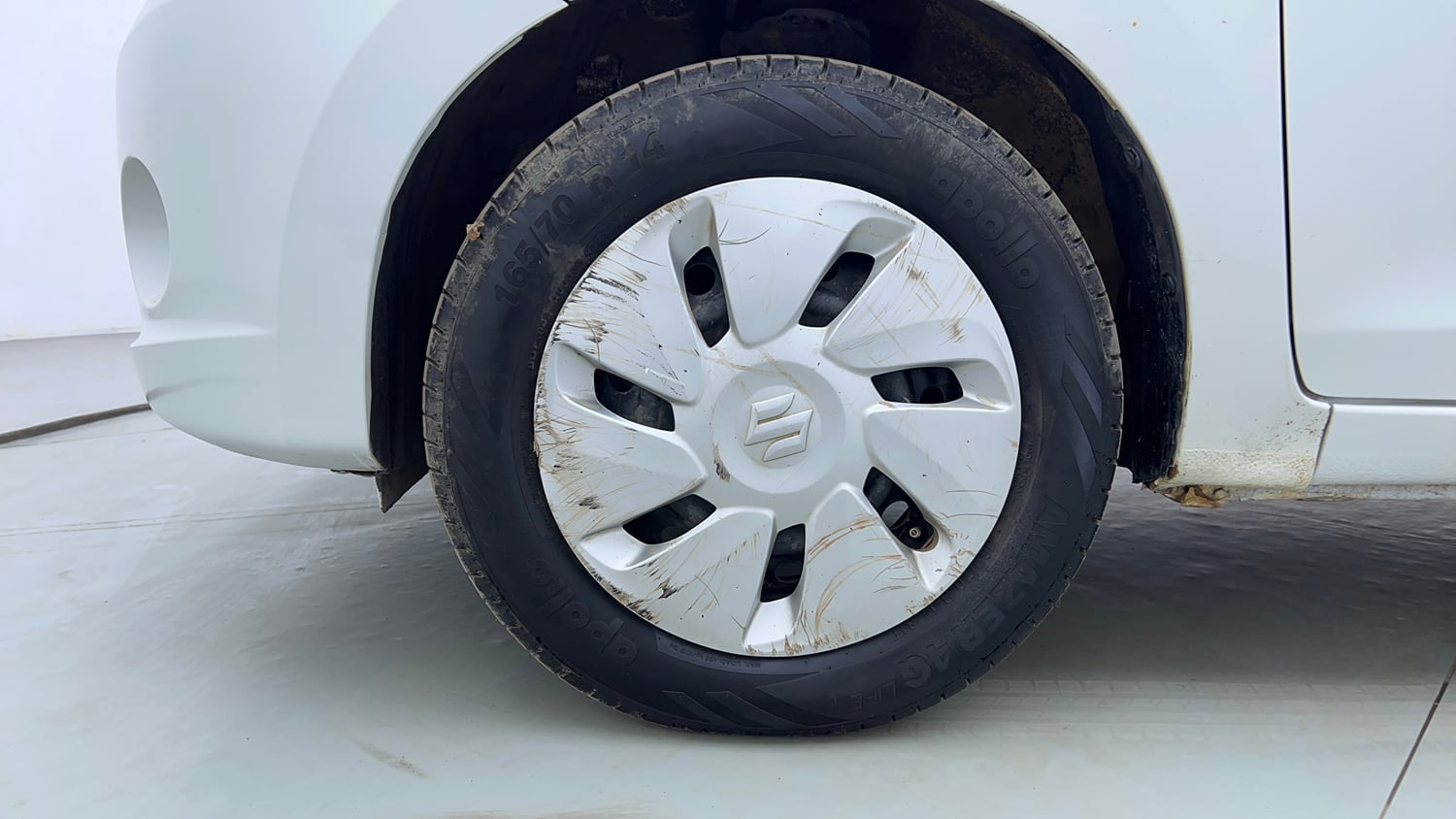 Used 2014 Maruti Suzuki Celerio VXi Petrol Manual tyres LEFT FRONT TYRE RIM VIEW
