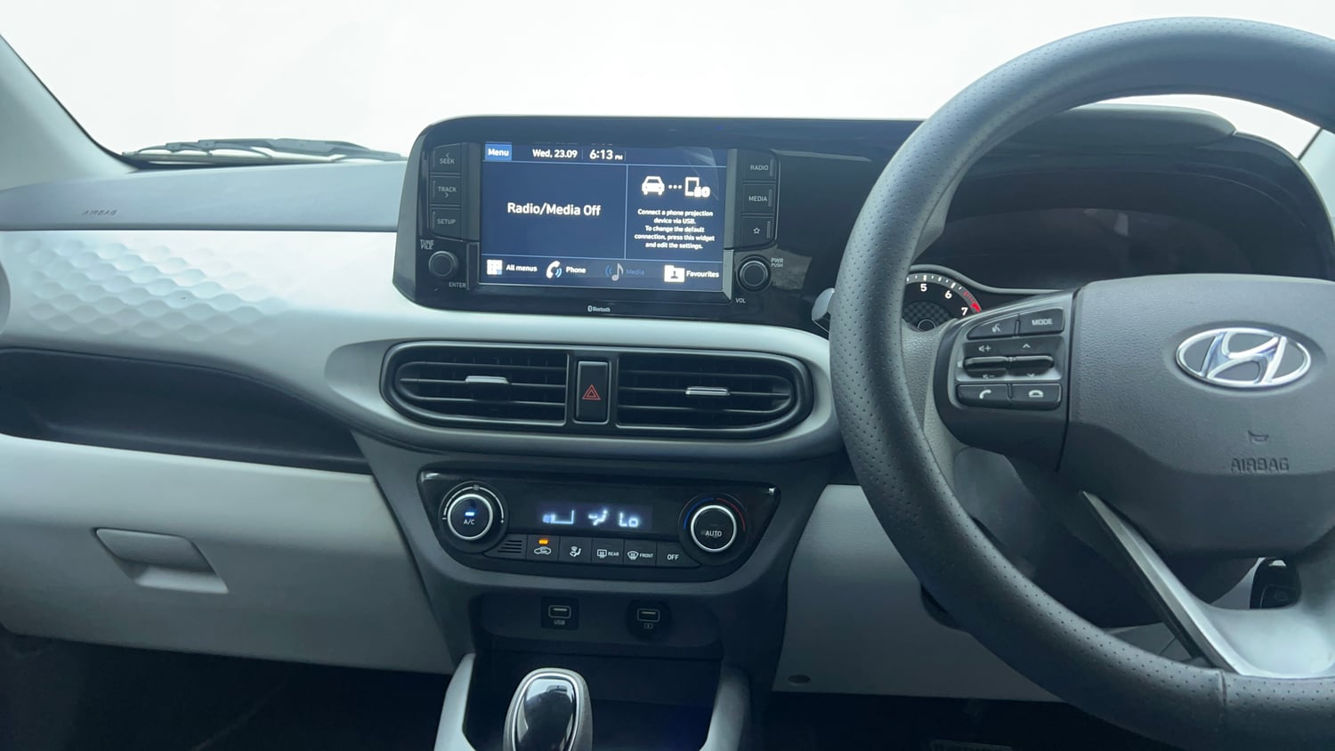 Used 2019 Hyundai Grand i10 Nios Sportz AMT 1.2 Kappa VTVT Petrol Automatic top_features Integrated (in-dash) music system