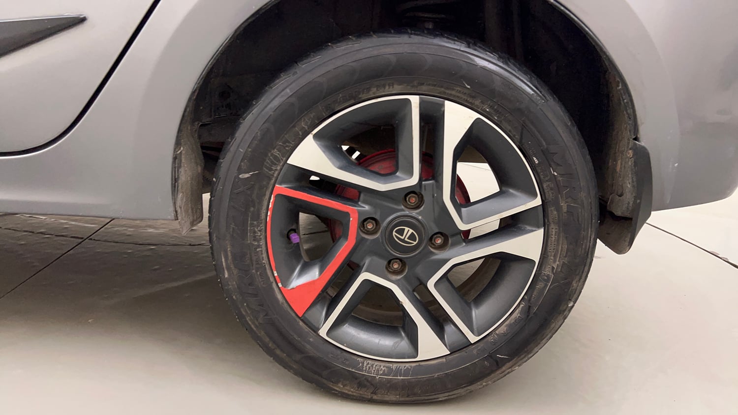 Used 2019 Tata Tigor Revotron XZ+ Petrol Manual tyres LEFT REAR TYRE RIM VIEW