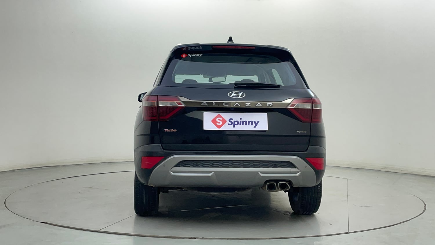 Used 2023 Hyundai Alcazar Signature (O) 6 STR 1.5 Petrol DCT Petrol Automatic exterior BACK VIEW