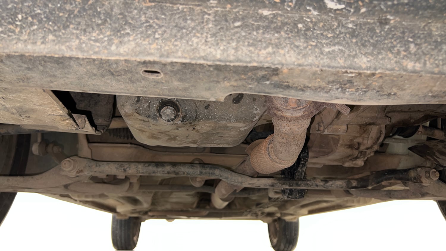 Used 2019 Tata Tigor Revotron XZ+ Petrol Manual extra FRONT LEFT UNDERBODY VIEW