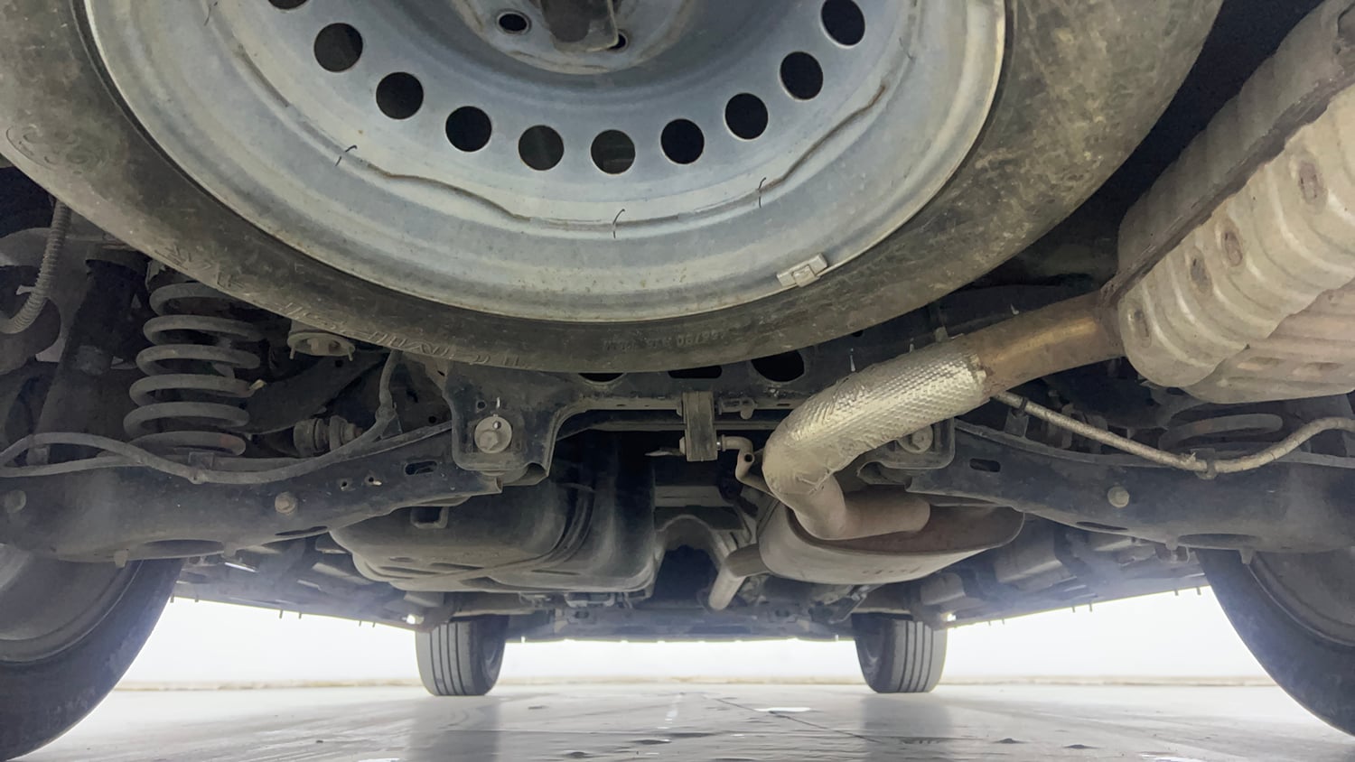 Used 2024 Mahindra XUV700 AX 7 Petrol AT Luxury Pack 7 STR Petrol Automatic extra REAR UNDERBODY VIEW (TAKEN FROM REAR)