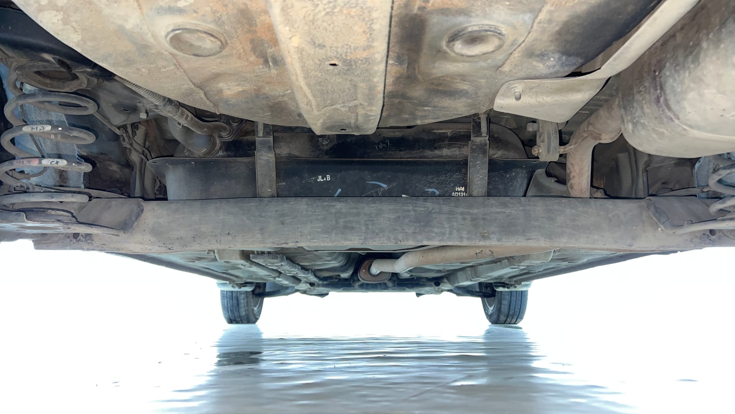 Used 2015 Hyundai Xcent S 1.2 (O) Petrol Manual extra REAR UNDERBODY VIEW (TAKEN FROM REAR)