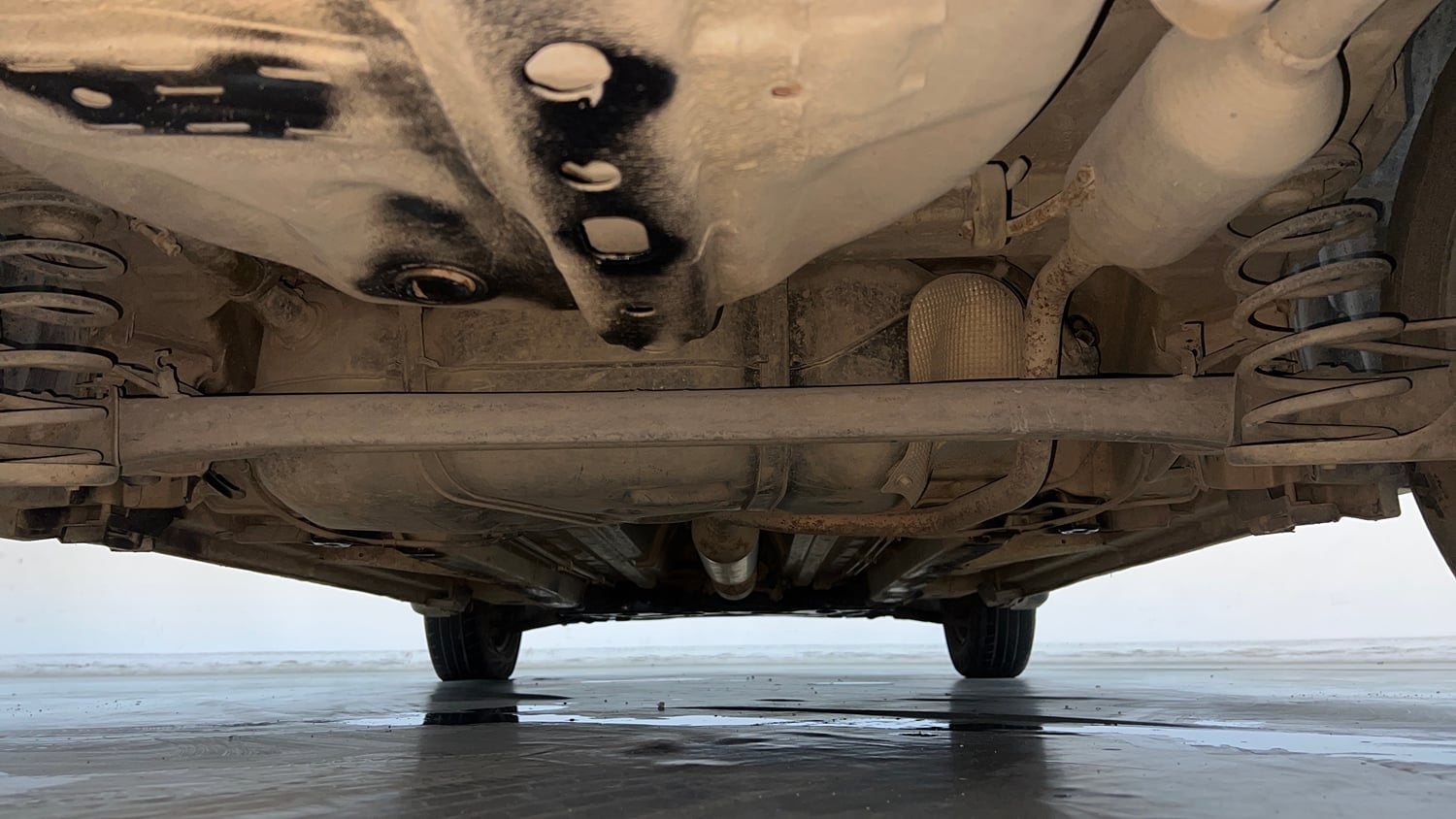 Used 2014 Maruti Suzuki Swift Dzire VXI Petrol Manual extra REAR UNDERBODY VIEW (TAKEN FROM REAR)
