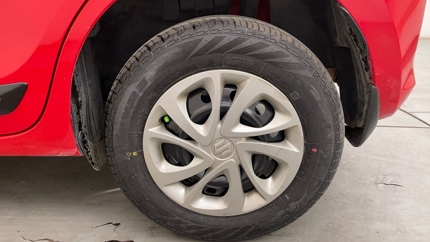 Used 2022 Maruti Suzuki Swift VXi AMT Petrol Automatic tyres LEFT REAR TYRE RIM VIEW
