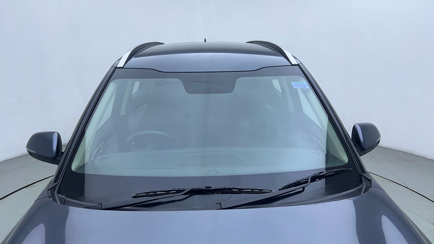 Used 2022 Kia Carens Prestige Plus 1.4 Petrol MT 7 STR Petrol Manual exterior FRONT WINDSHIELD VIEW