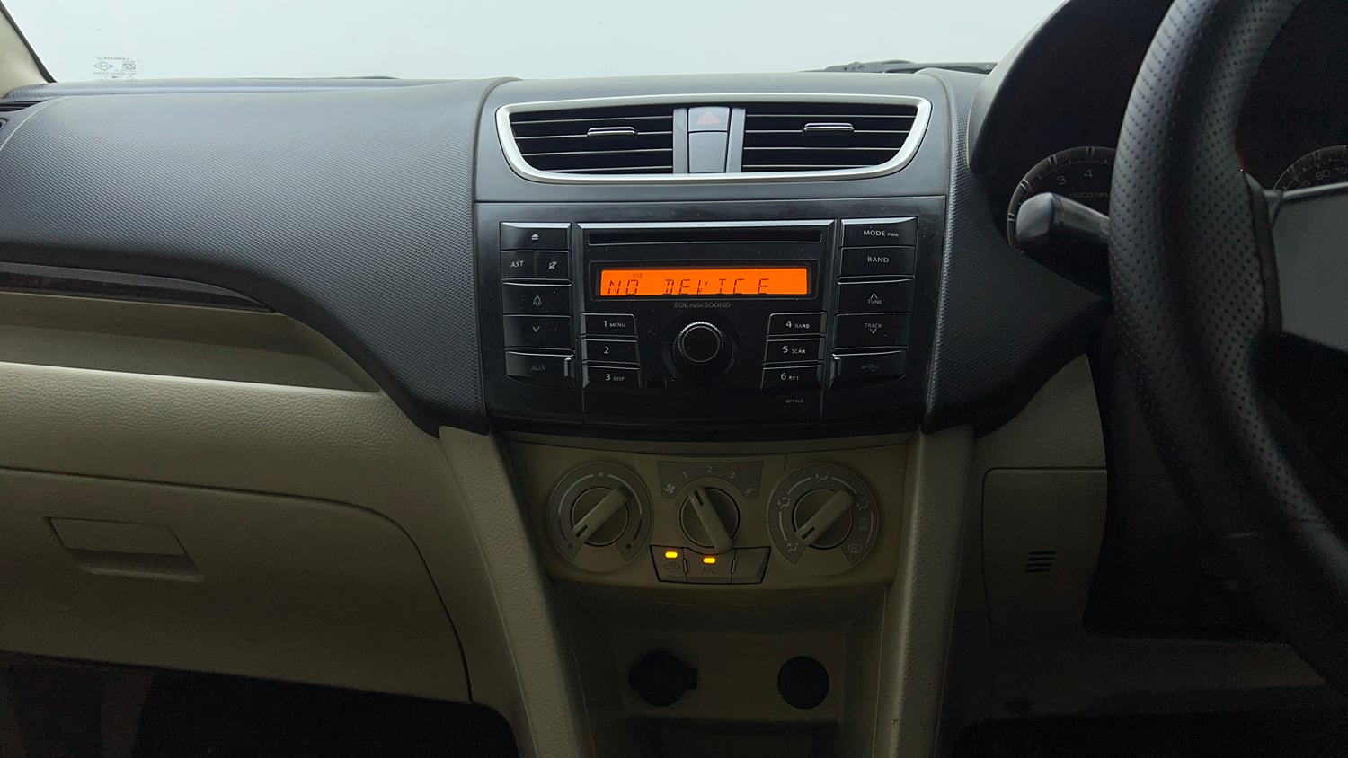 Used 2014 Maruti Suzuki Swift Dzire VXI Petrol Manual interior MUSIC SYSTEM & AC CONTROL VIEW