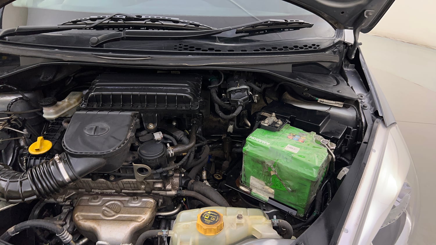 Used 2018 Tata Tiago Revotron XZ w/o Alloy Petrol Manual engine ENGINE LEFT SIDE HINGE & APRON VIEW