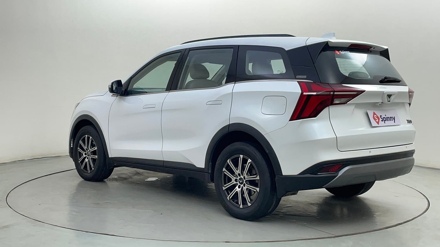 Used 2025 Mahindra XUV700 AX7 Petrol MT 7 STR Petrol Manual exterior LEFT REAR CORNER VIEW