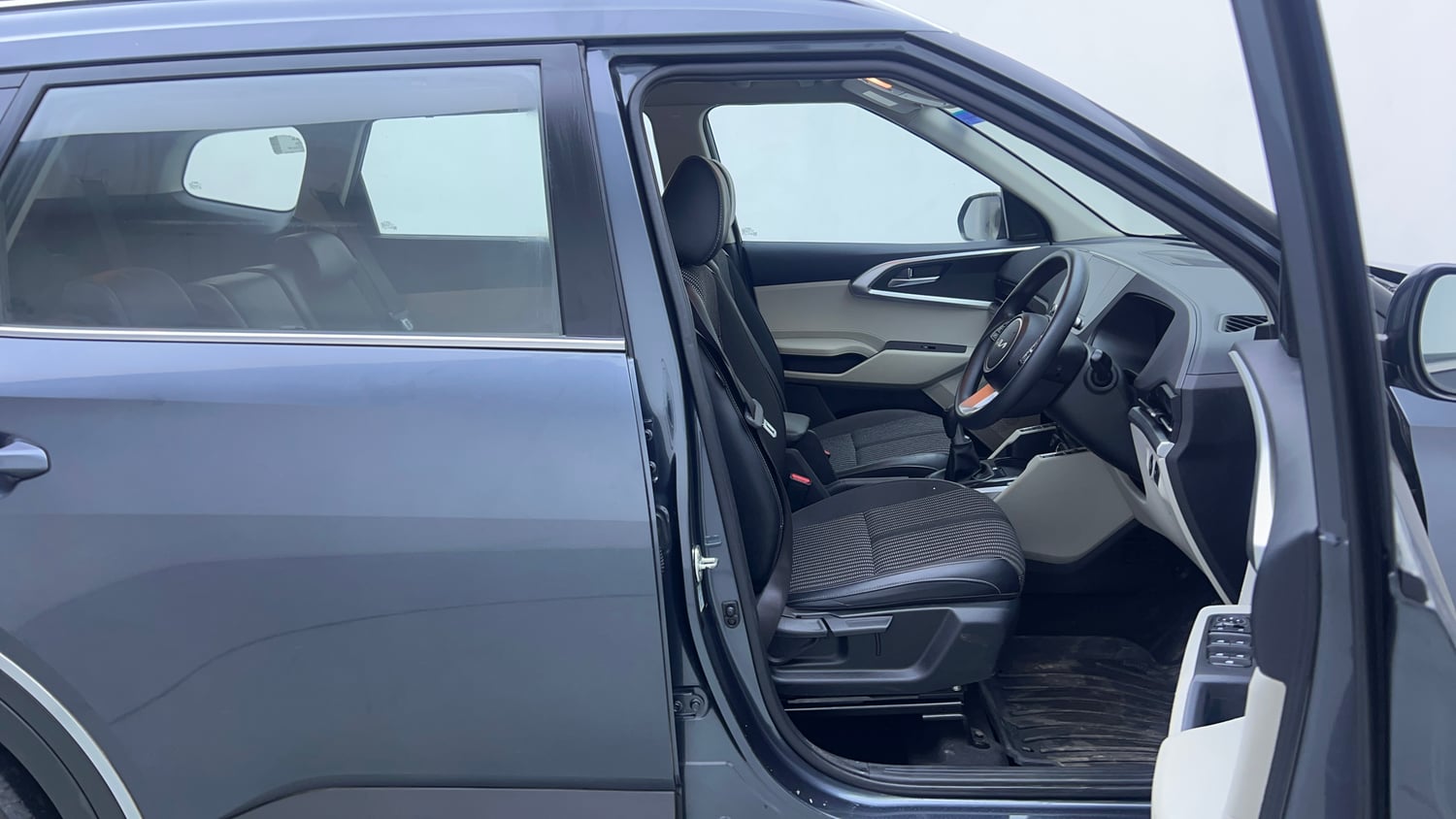 Used 2022 Kia Carens Prestige Plus 1.4 Petrol MT 7 STR Petrol Manual interior RIGHT SIDE FRONT DOOR CABIN VIEW