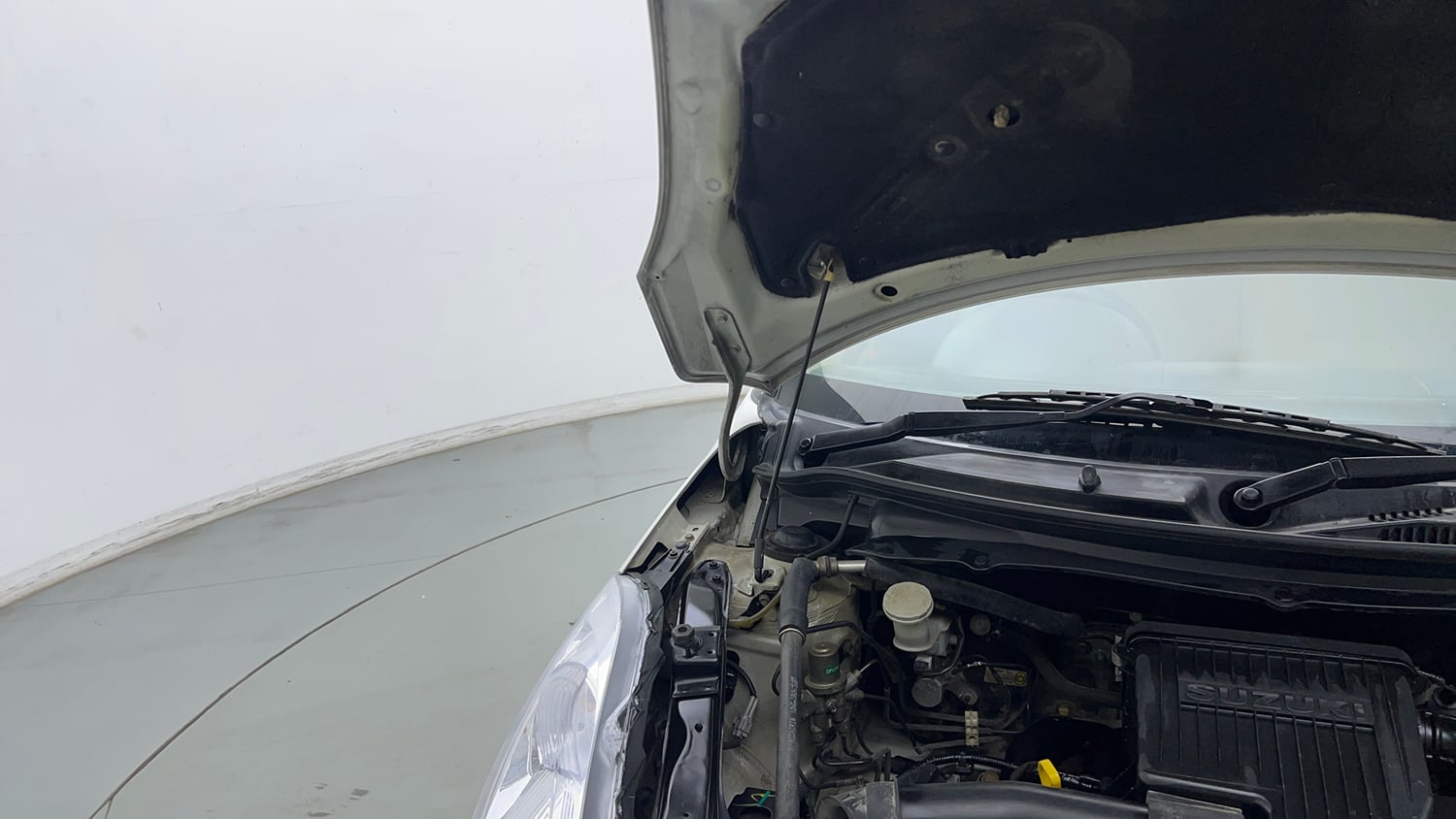 Used 2014 Maruti Suzuki Swift Dzire VXI Petrol Manual engine ENGINE RIGHT SIDE HINGE & APRON VIEW