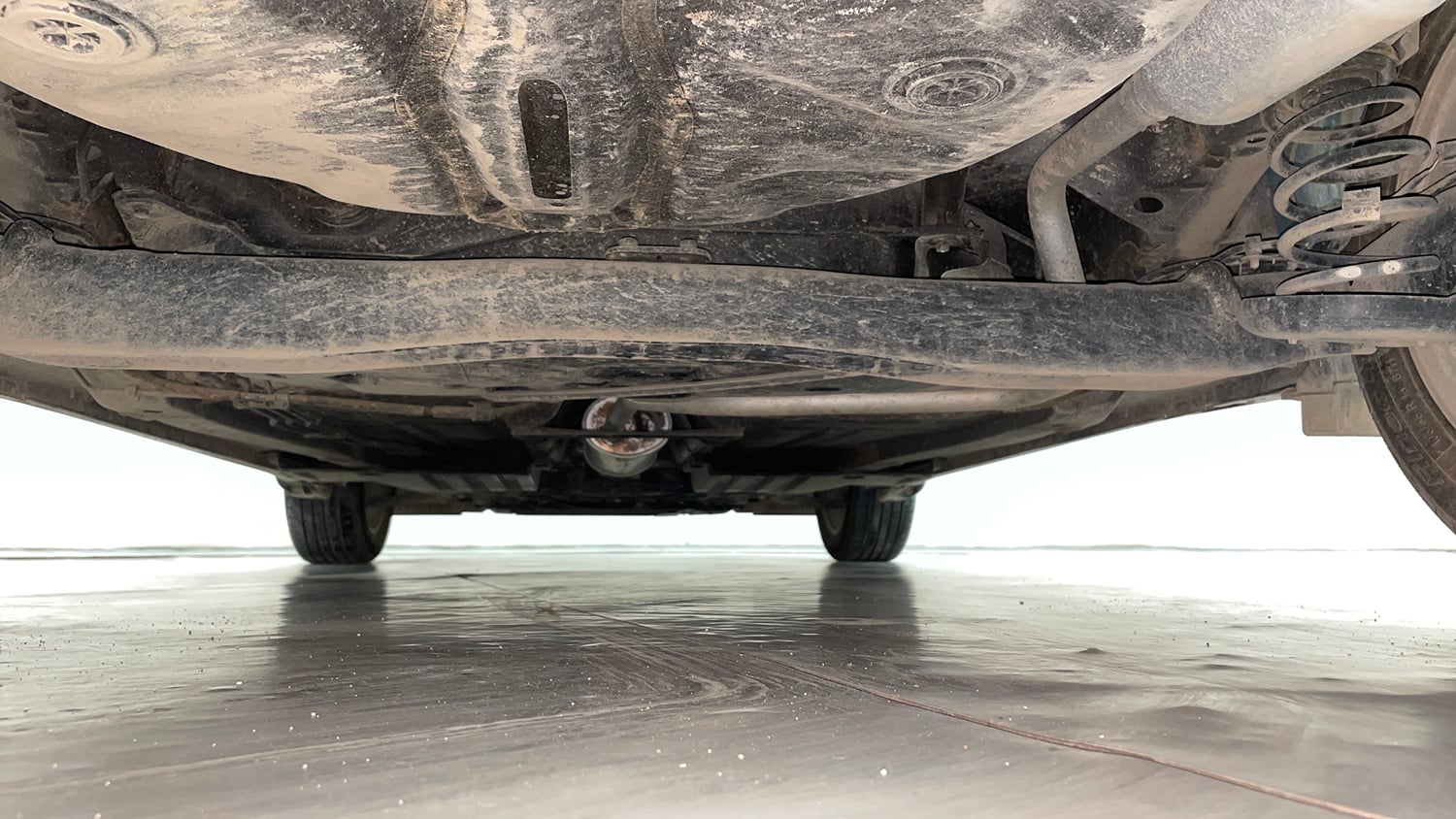 Used 2025 Toyota Glanza V AMT Petrol Automatic extra REAR UNDERBODY VIEW (TAKEN FROM REAR)