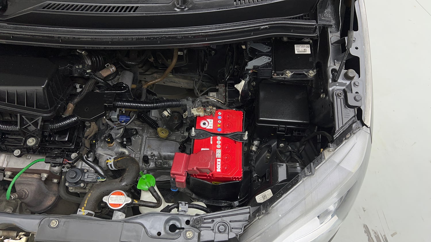 Used 2022 Maruti Suzuki Wagon R VXI 1.0 Petrol Manual engine ENGINE LEFT SIDE VIEW