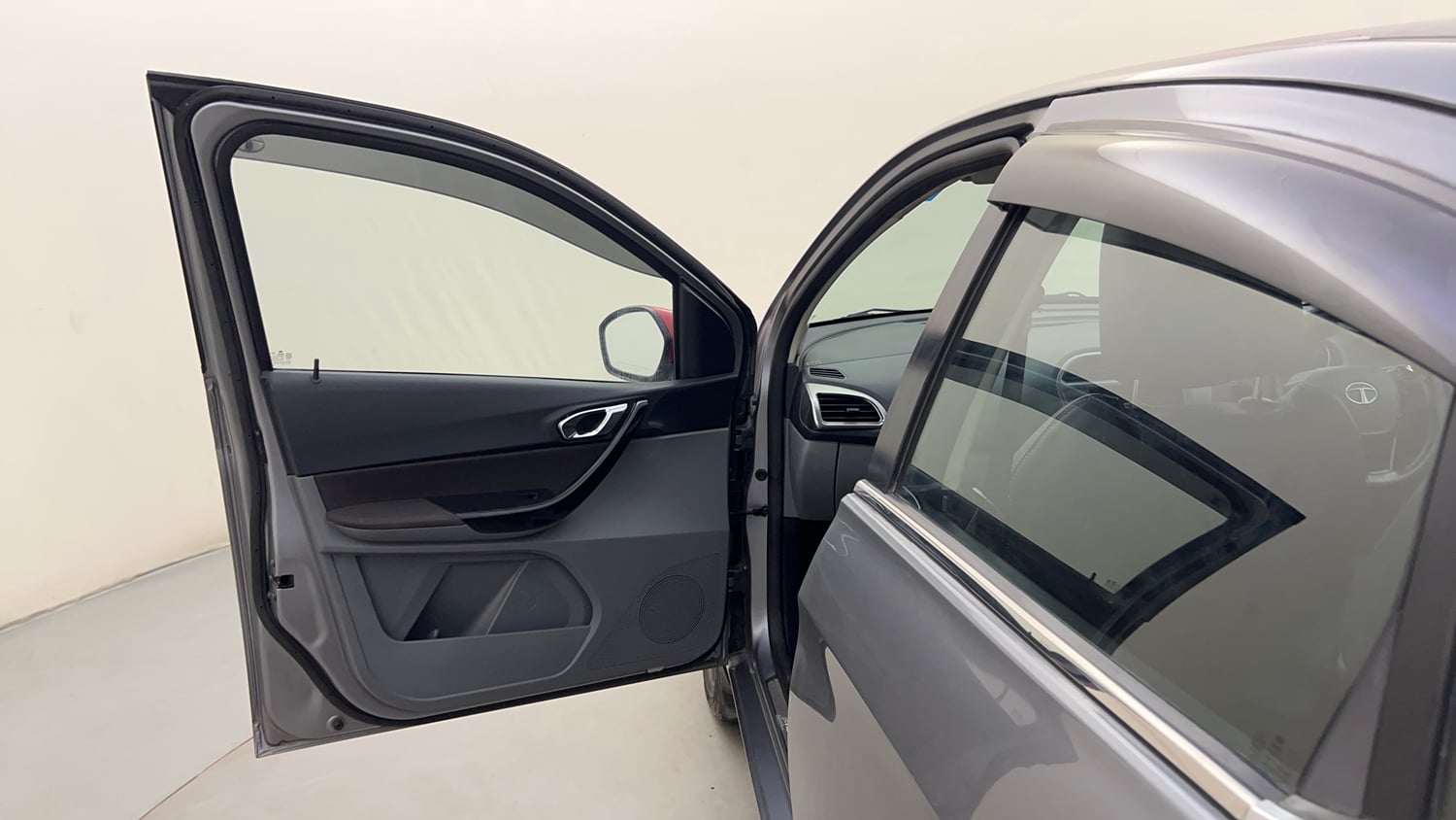 Used 2019 Tata Tigor Revotron XZ+ Petrol Manual interior LEFT FRONT DOOR OPEN VIEW