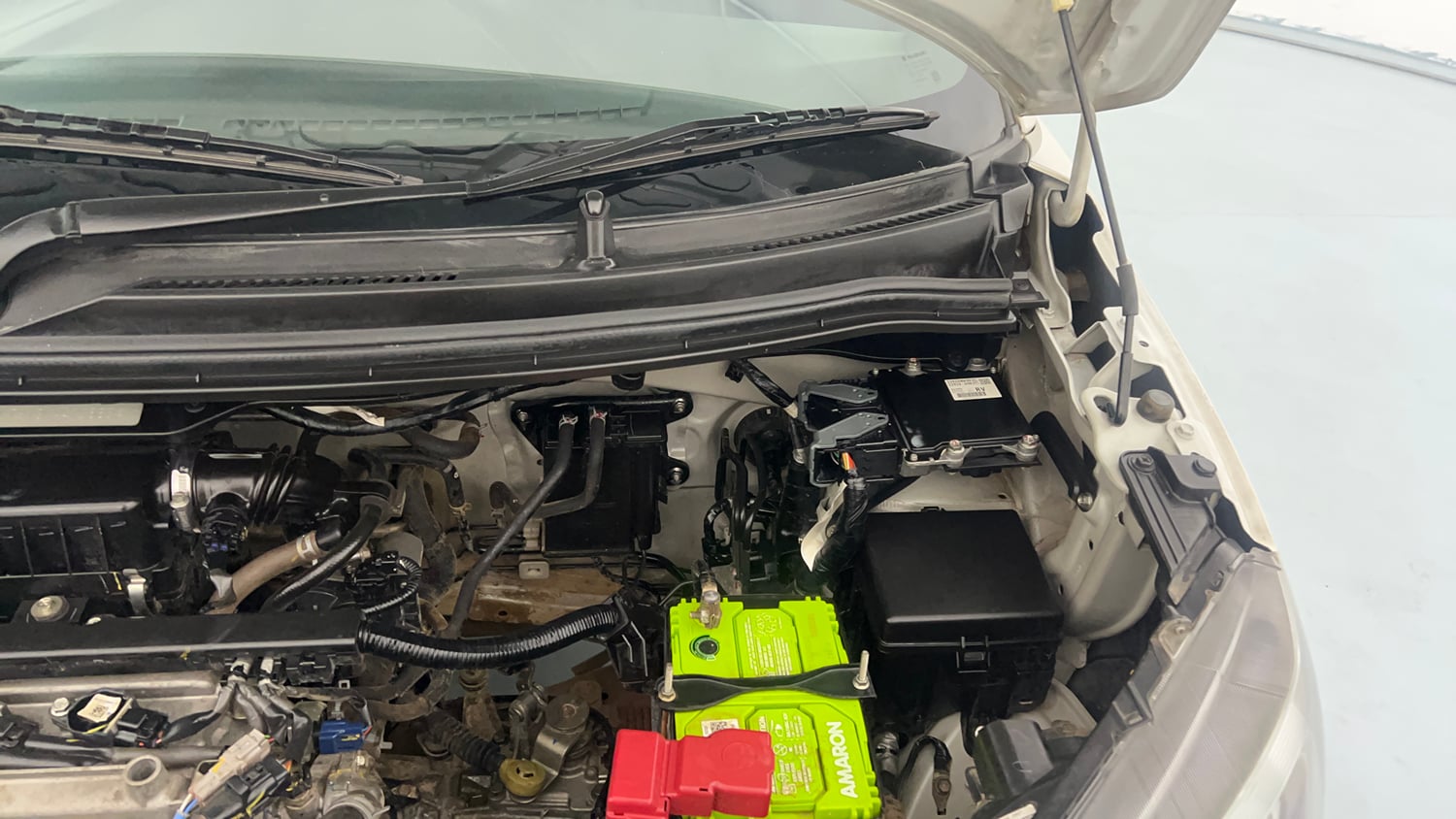 Used 2021 Maruti Suzuki Wagon R 1.0 VXi 1.0 Petrol Manual engine ENGINE LEFT SIDE HINGE & APRON VIEW