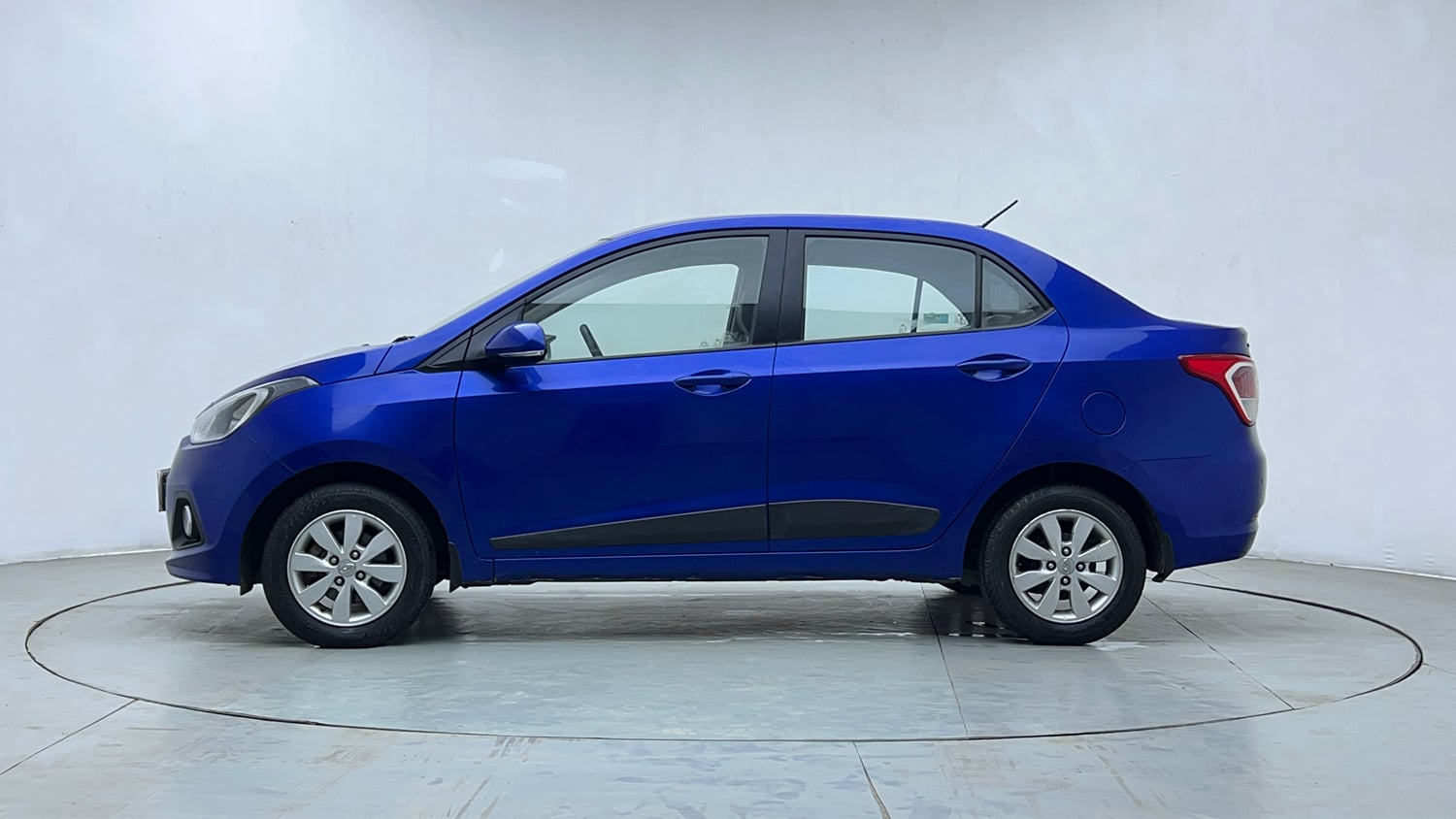Used 2015 Hyundai Xcent S 1.2 (O) Petrol Manual exterior LEFT SIDE VIEW