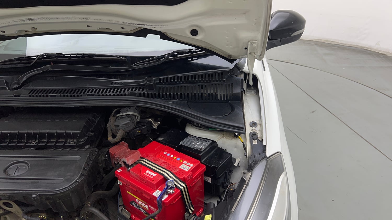 Used 2024 Tata Tigor XZ Plus CNG Cng Manual engine ENGINE LEFT SIDE HINGE & APRON VIEW