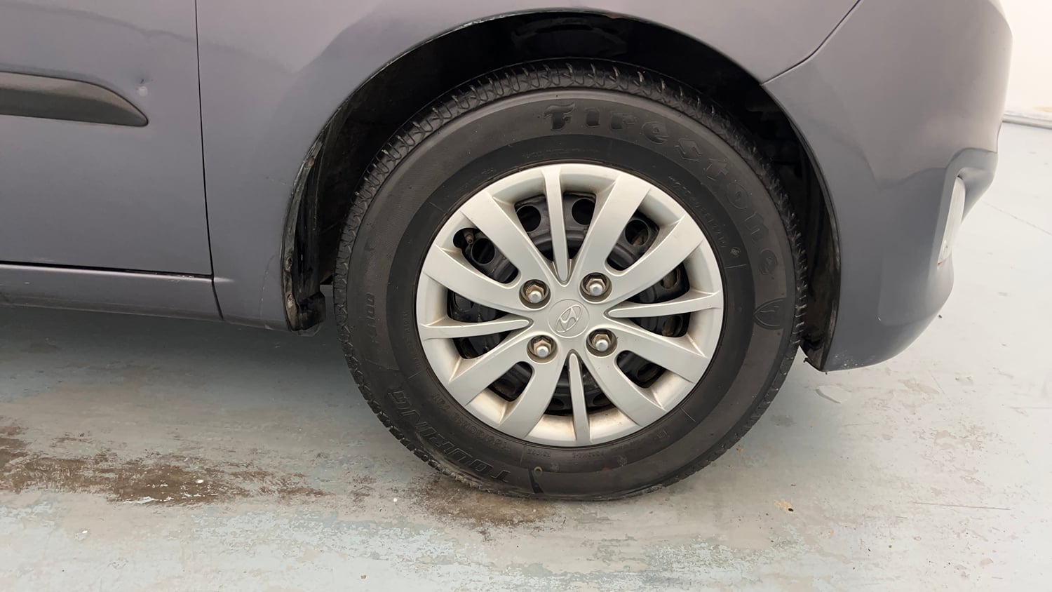 Used 2014 Hyundai i10 Sportz 1.1 iRDE2 Petrol Manual tyres RIGHT FRONT TYRE RIM VIEW