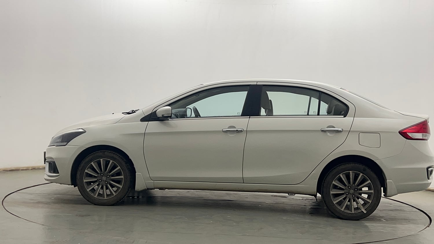 Used 2022 Maruti Suzuki Ciaz Alpha 1.5 Petrol Manual exterior LEFT SIDE VIEW